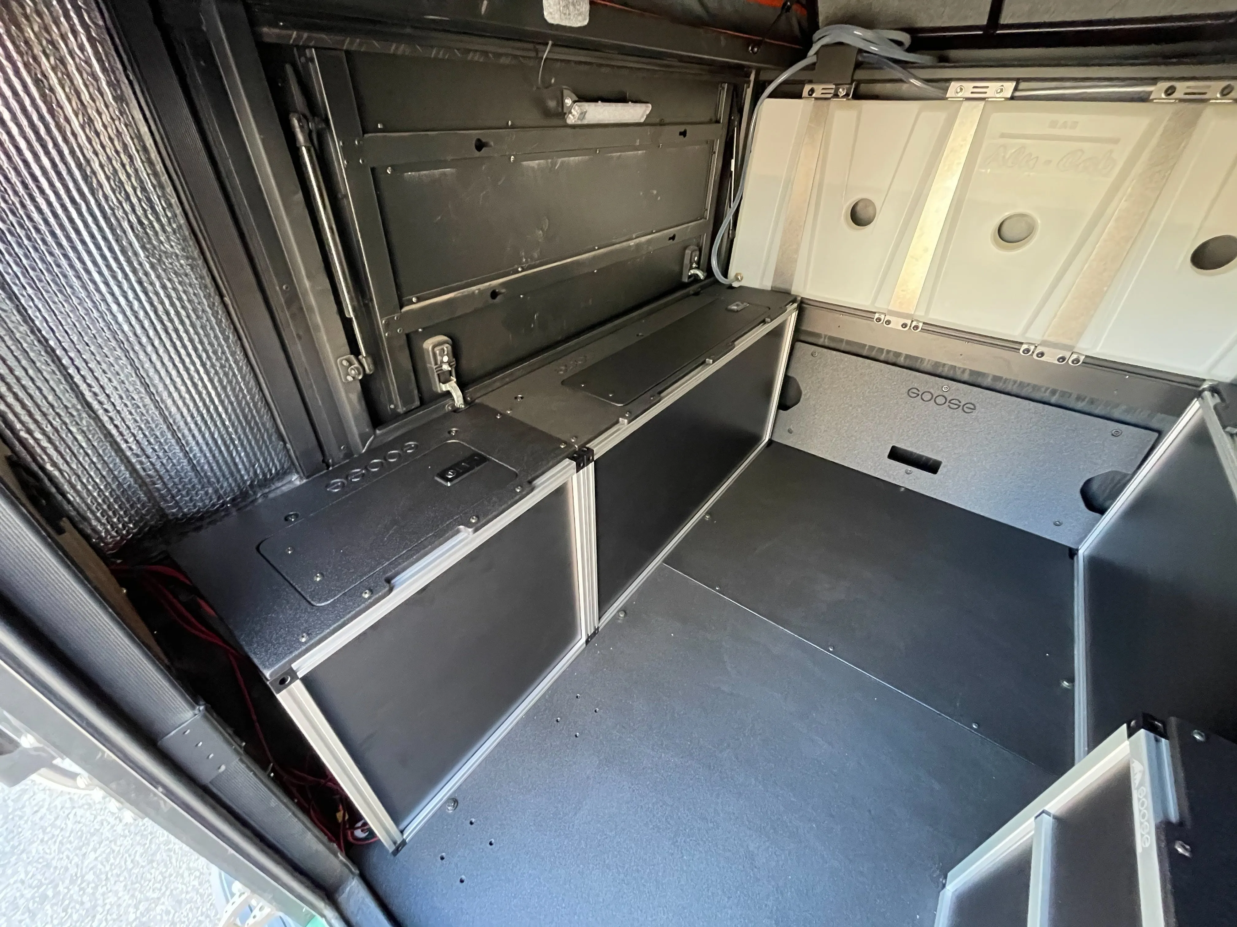 Alu-Cab Canopy Camper V2 - Toyota Tacoma 2005-Present 2nd & 3rd Gen. - Front Utility Module - 6' Bed